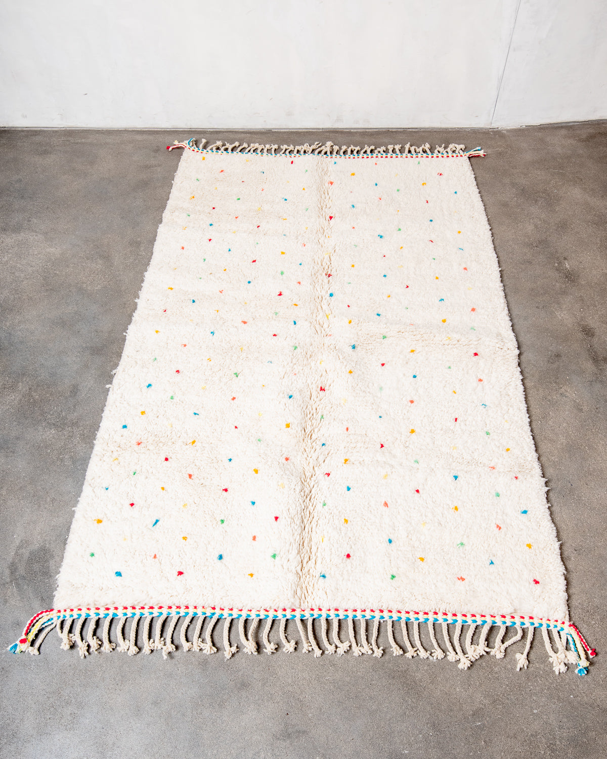 Modern, designer, handcrafted Berber rug from Morocco. Beniourain carpet with beautiful colours and patterns and fluffy wool texture.
